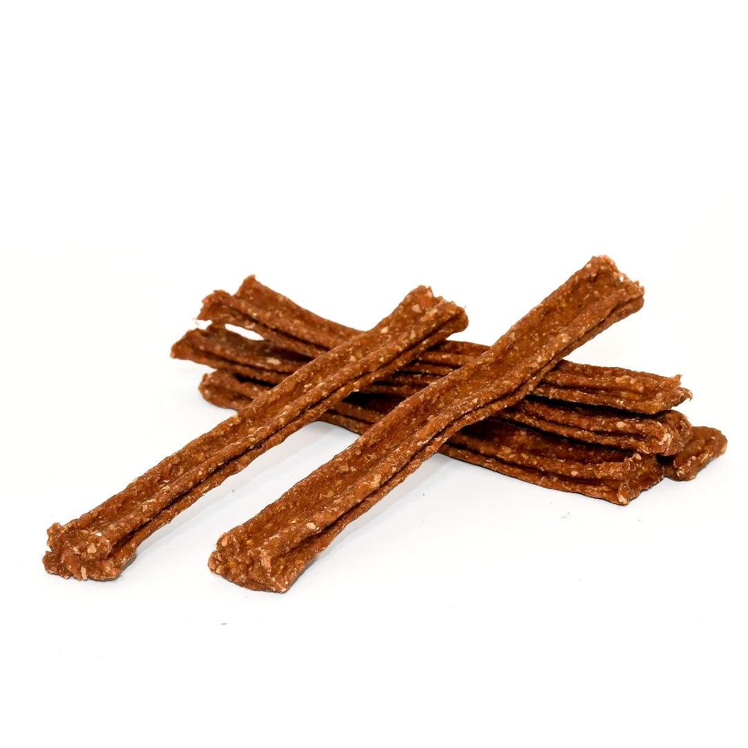 Batoane de ros cu rață pentru câini, văzute de sus – conțin glucozamină și extract natural din midii cu buze verzi
